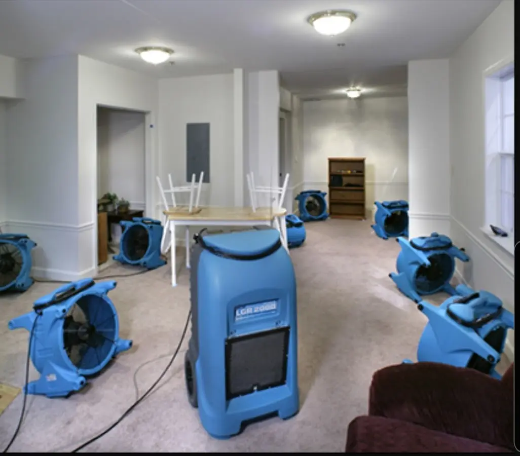 Air movers and dehumidifier setup for Water Damage Restoration in Lake Hallie